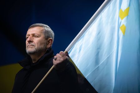 KYIV, UKRAINE - Dec. 08, 2019: Thousands ukrainians attend rally against surrender on the Independence Square in Kyiv. Deputy Head of the Mejlis of the Crimean Tatar People Ahtem Chyhozのeditorial素材