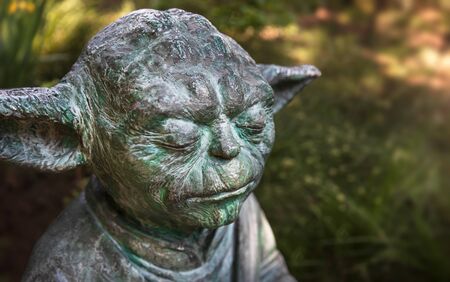 KYIV, UKRAINE - Jun. 06, 2019: The statue of the master Yoda of the character of the fantastic saga Star Wars on the territory of the Botanical Garden in Kievのeditorial素材