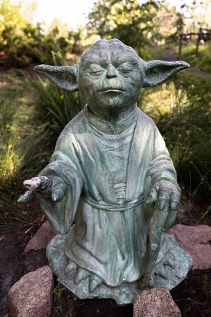 KYIV, UKRAINE - Jun. 06, 2019: The statue of the master Yoda of the character of the fantastic saga Star Wars on the territory of the Botanical Garden in Kievのeditorial素材