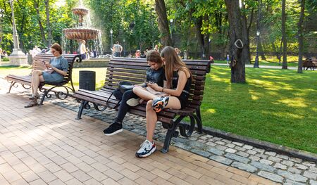 KYIV, UKRAINE - Jun. 06, 2019: Volodymyrska Hill or Saint Volodymyr Hill in Kyiv. Young people are...