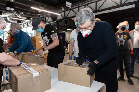 Kyiv, Ukraine - Mar. 27, 2020: Coronavirus epidemic in Ukraine and help to the poor. 3 thousand food...