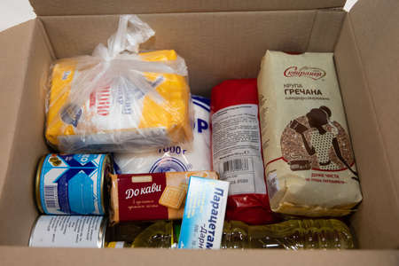 Kyiv, Ukraine - Mar. 27, 2020: Coronavirus epidemic in Ukraine and help to the poor. 3 thousand food...