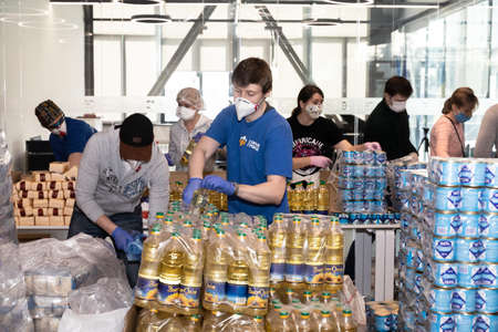 KYIV, UKRAINE - Apr. 04, 2020: Coronavirus epidemic in Ukraine and help to the poor. Thousands food packages from the Poroshenko Foundation sent to pensioners and people with disabilitiesのeditorial素材