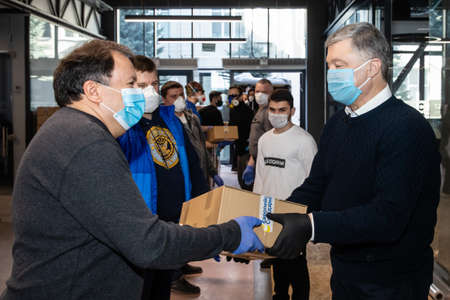 KYIV, UKRAINE - Apr. 04, 2020: Coronavirus epidemic in Ukraine and help to the poor. Thousands food packages from the Poroshenko Foundation sent to pensioners and people with disabilitiesのeditorial素材