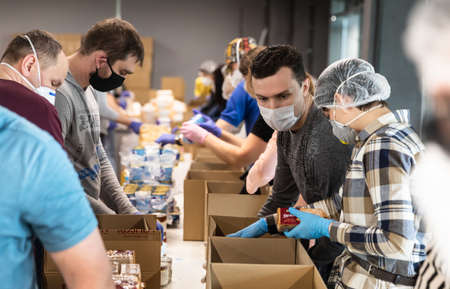 KYIV, UKRAINE - Apr. 04, 2020: Coronavirus epidemic in Ukraine and help to the poor. Thousands food...