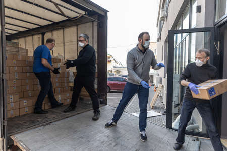 KYIV, UKRAINE - Apr. 04, 2020: Coronavirus epidemic in Ukraine and help to the poor. Thousands food...
