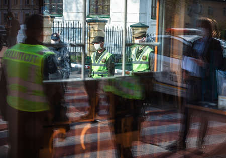 Kyiv, Ukraine - Apr. 13, 2020: The National Guard and the patrol police of Ukraine control the entrance to the Kyiv Pechersk Lavra during quarantine due to the coronavirus epidemicのeditorial素材