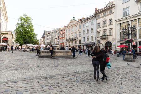 Lviv, Ukraine - May 23, 2020: Central streets and architecture of Lviv. Vacationers and tourists on the streets of Lviv during the coronavirus epidemicのeditorial素材