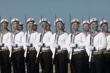 VASYLKIV, UKRAINE - Aug. 23, 2020: Honor guard during the ceremony of raising the State Flag of Ukraine at the military airfield in Vasylkiv, Kyiv regionのeditorial素材