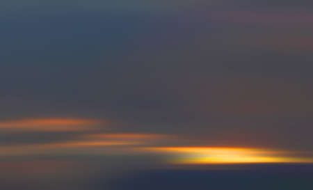 Abstract blurred nature background. Clouds in motion blur. Background for design and templates