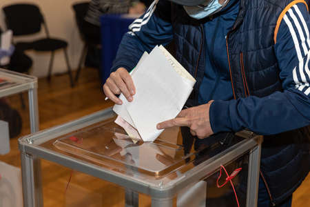 KYIV, UKRAINE - Oct 25, 2020: Elections in Ukraine. The process of voting at a polling station