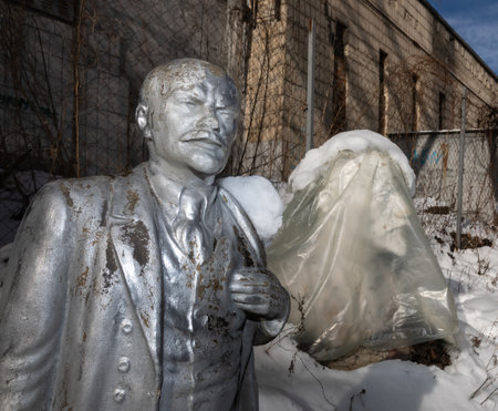 KYIV, UKRAINE - Jan. 31, 2021: Monuments of the era of totalitarianism collected in a snowy...