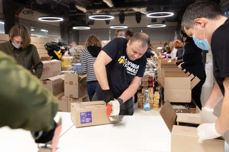 KYIV, UKRAINE - Apr. 17, 2021: Humanitarian aid. Coronavirus epidemic in Ukraine. Help to the poor....