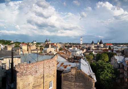 LVIV, UKRAINE - Jun. 20, 2021: Aerial view of historical old city district of Lviv. Churches, cathedrals, city hall and houses roofs in old Lviv. Lviv panoramic viewのeditorial素材