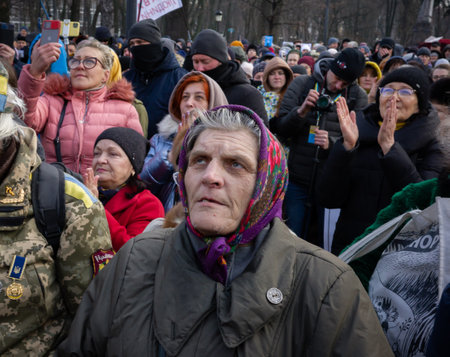 KYIV, UKRAINE - Nov. 24, 2021: Several hundred people protest against coronavirus restrictions and mandatory vaccinations.のeditorial素材