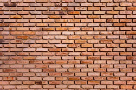 Brick wall with red bricks. Red brick background.