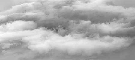 Dramatic Cloudscape Area. dark clouds. Storm clouds backgroun. Image in light gray toneの写真素材