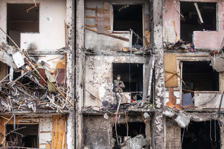 KYIV, UKRAINE - Feb. 25, 2022: War of Russia against Ukraine. A residential building damaged by an enemy aircraft in the Ukrainian capital Kyivのeditorial素材