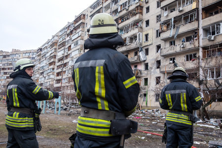 KYIV, UKRAINE - Feb. 25, 2022: War of Russia against Ukraine. A residential building damaged by an enemy aircraft in the Ukrainian capital Kyivのeditorial素材
