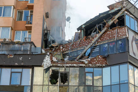 KYIV, UKRAINE - Feb. 25, 2022: War of Russia against Ukraine. View of a civilian building damaged...