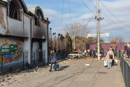 IRPIN, UKRAINE - Mar. 09, 2022: War in Ukraine. Thousands of residents of Irpin have to abandon...