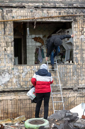 KYIV, UKRAINE - Mar. 14, 2022: War in Ukraine. Completely destroyed residential building that was hit by a shell, as Russia's attack on Ukraine continues, in the Obolon district in Kyivのeditorial素材