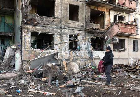 KYIV, UKRAINE - Mar. 14, 2022: War in Ukraine. Completely destroyed residential building that was...