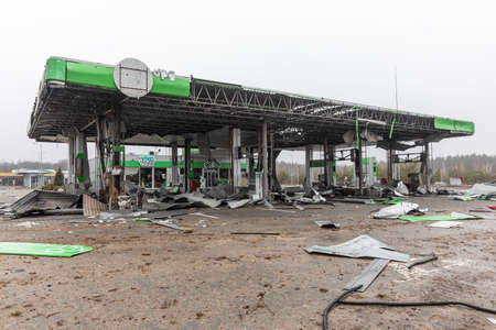 KYIV REG., UKRAINE - Apr. 02, 2022: Chaos, devastation and death at a gas station seen on a...