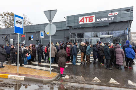 BUCHA, UKRAINE - Apr. 03, 2022: Kyiv Territorial Defense distributes humanitarian aid and food to...
