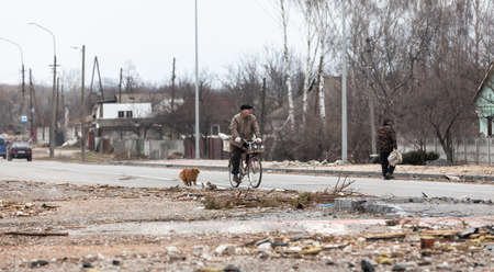 CHERNIHIV, UKRAINE - Apr. 05, 2022: War in Ukraine. Chaos and destroyed houses on the streets of...