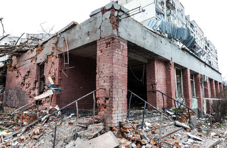 CHERNIHIV, UKRAINE - Apr. 05, 2022: War in Ukraine. Chaos and destroyed houses on the streets of...