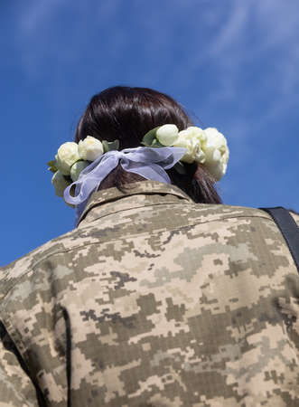 KYIV, UKRAINE - Apr. 07, 2022: War and Love. Members of the Kyiv territorial defense married in Kyiv under the laws of martial law, Kyiv, Ukraineのeditorial素材