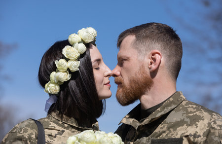 KYIV, UKRAINE - Apr. 07, 2022: War and Love. Members of the Kyiv territorial defense married in Kyiv...