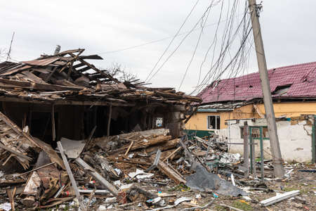 BORODYANKA, UKRAINE - APR. 06, 2022: War in Ukraine. Chaos and devastation on the streets of Borodyanka as a result of the attack of Russian invadersのeditorial素材