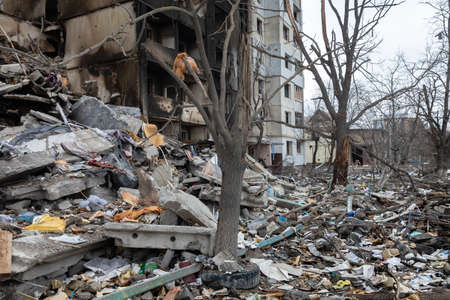 BORODYANKA, UKRAINE - APR. 06, 2022: War in Ukraine. Chaos and devastation on the streets of Borodyanka as a result of the attack of Russian invadersのeditorial素材