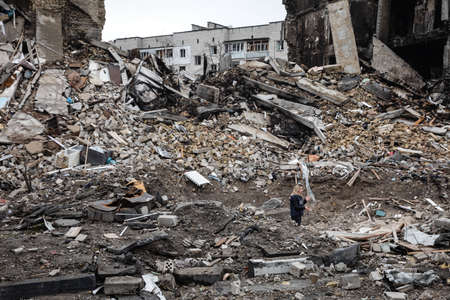 BORODYANKA, UKRAINE - APR. 06, 2022: War in Ukraine. Chaos and devastation on the streets of Borodyanka as a result of the attack of Russian invadersのeditorial素材