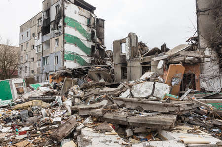 BORODYANKA, UKRAINE - APR. 06, 2022: War in Ukraine. Chaos and devastation on the streets of Borodyanka as a result of the attack of Russian invadersのeditorial素材