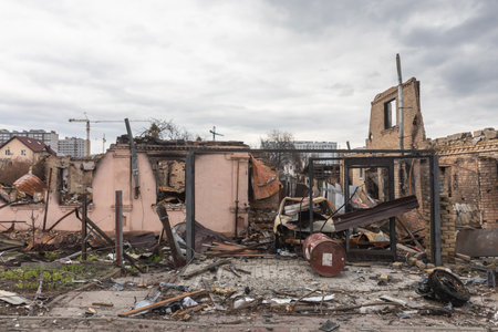 BUCHA, UKRAINE - Apr. 06, 2022: War in Ukraine. Chaos and devastation on the streets of Bucha as a result of the attack of Russian invadersのeditorial素材