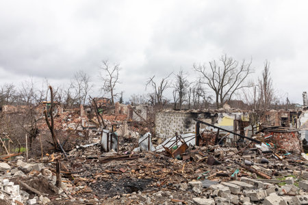 CHERNIHIV REG., UKRAINE - Apr. 18, 2022: Russia's war against Ukraine. Completely destroyed houses and chaos in the Chernihiv region as a result of the attack of Russian invadersのeditorial素材