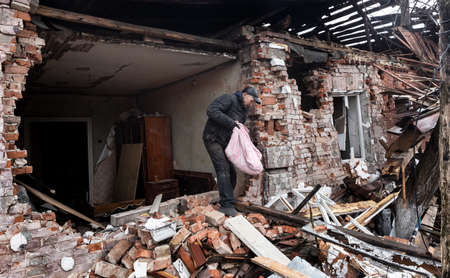 CHERNIHIV REG., UKRAINE - Apr. 18, 2022: Russia's war against Ukraine. Completely destroyed houses and chaos in the Chernihiv region as a result of the attack of Russian invadersのeditorial素材