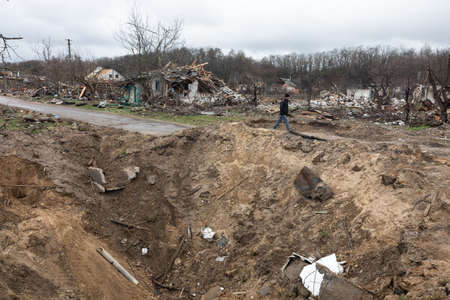 CHERNIHIV REG., UKRAINE - Apr. 18, 2022: Russia's war against Ukraine. Completely destroyed houses...