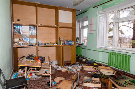 Chernihiv reg., Ukraine - Apr 20, 2022: Chaos and disorder in the partially destroyed school classrooms as a result of the Russian occupationのeditorial素材