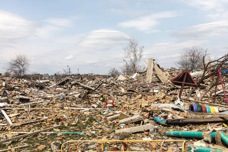 MAKARIV, UKRAINE - Apr. 23, 2022: Destroyed kindergarten as a result of the invasion of Ukraine by the Russian occupation forces. Russians throw air bomb on it at night on March 26のeditorial素材