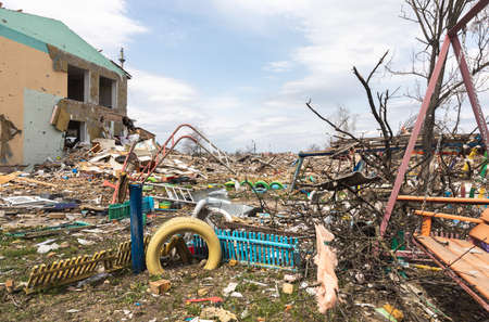MAKARIV, UKRAINE - Apr. 23, 2022: Destroyed kindergarten as a result of the invasion of Ukraine by the Russian occupation forces. Russians throw air bomb on it at night on March 26のeditorial素材