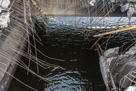 MAKARIV, KYIV REG., UKRAINE - Apr. 23, 2022: War of Russia against Ukraine. Damaged bridge in the village of Makariv as a result of the invasion of Russian invadersのeditorial素材