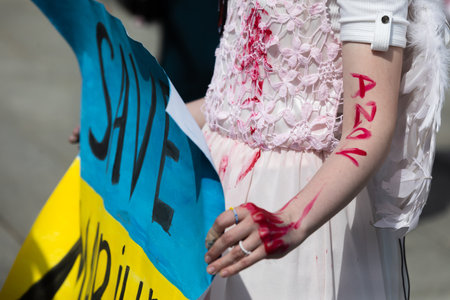 KYIV, UKRAINE - May 23, 2022: Wifes, mothers, kids of Ukrainian soldiers and members of Azov Battalion attend a rally to help organize a humanitarian corridor for the evacuation from Mariupolのeditorial素材