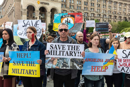 KYIV, UKRAINE - May 23, 2022: Wifes, mothers, kids of Ukrainian soldiers and members of Azov Battalion attend a rally to help organize a humanitarian corridor for the evacuation from Mariupolのeditorial素材