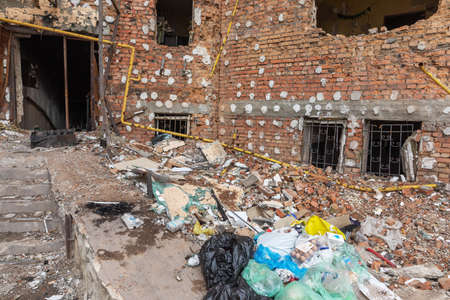 IRPIN, UKRAINE - May. 13, 2022: War of Russia against Ukraine. A residential building damaged by russian invaders in Irpin. Devastation and chaos as a result of Russia's military invasion of Ukraineのeditorial素材