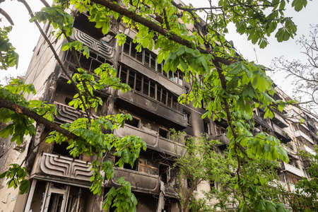 IRPIN, UKRAINE - May. 13, 2022: War of Russia against Ukraine. A residential building damaged by russian invaders in Irpin. Devastation and chaos as a result of Russia's military invasion of Ukraineのeditorial素材