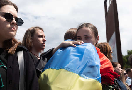 KYIV, UKRAINE - Jun. 18, 2022: War in Ukraine. Funeral Ceremony Of The Fallen Soldier And Activist Roman Ratushnyi. He was killed near Izyum while fighting for Ukrainian army against Russian invadersのeditorial素材